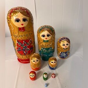 Vintage Nesting Doll Set of Nine Beautiful Bright Gilded Hand Painted Signed